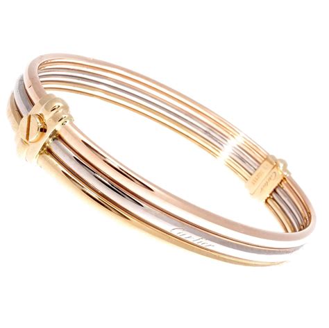 cartier three gold bracelet|cartier gold bracelet with screws.